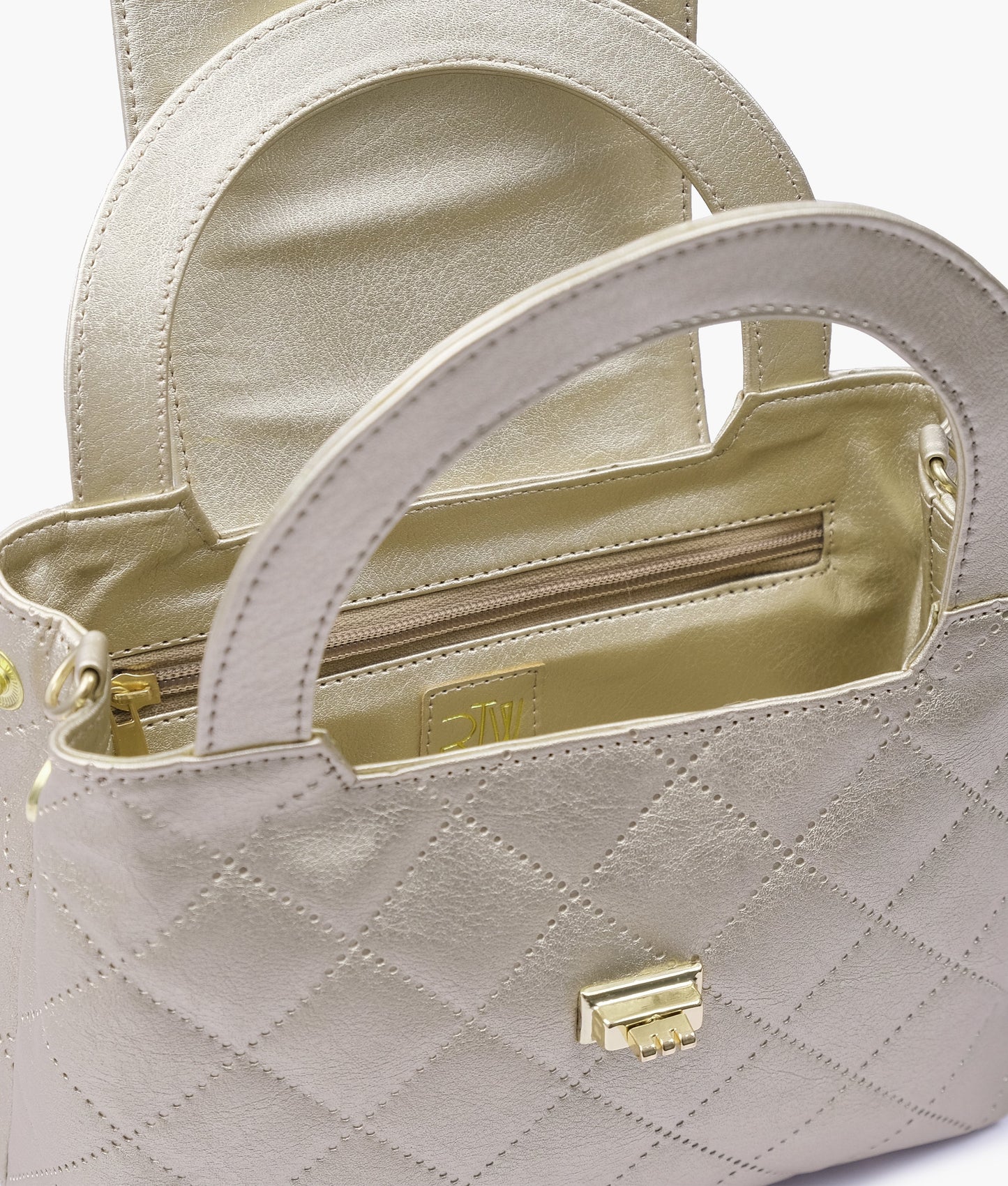 Golden flap quilted bag with top handle