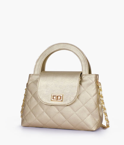 Golden flap quilted bag with top handle